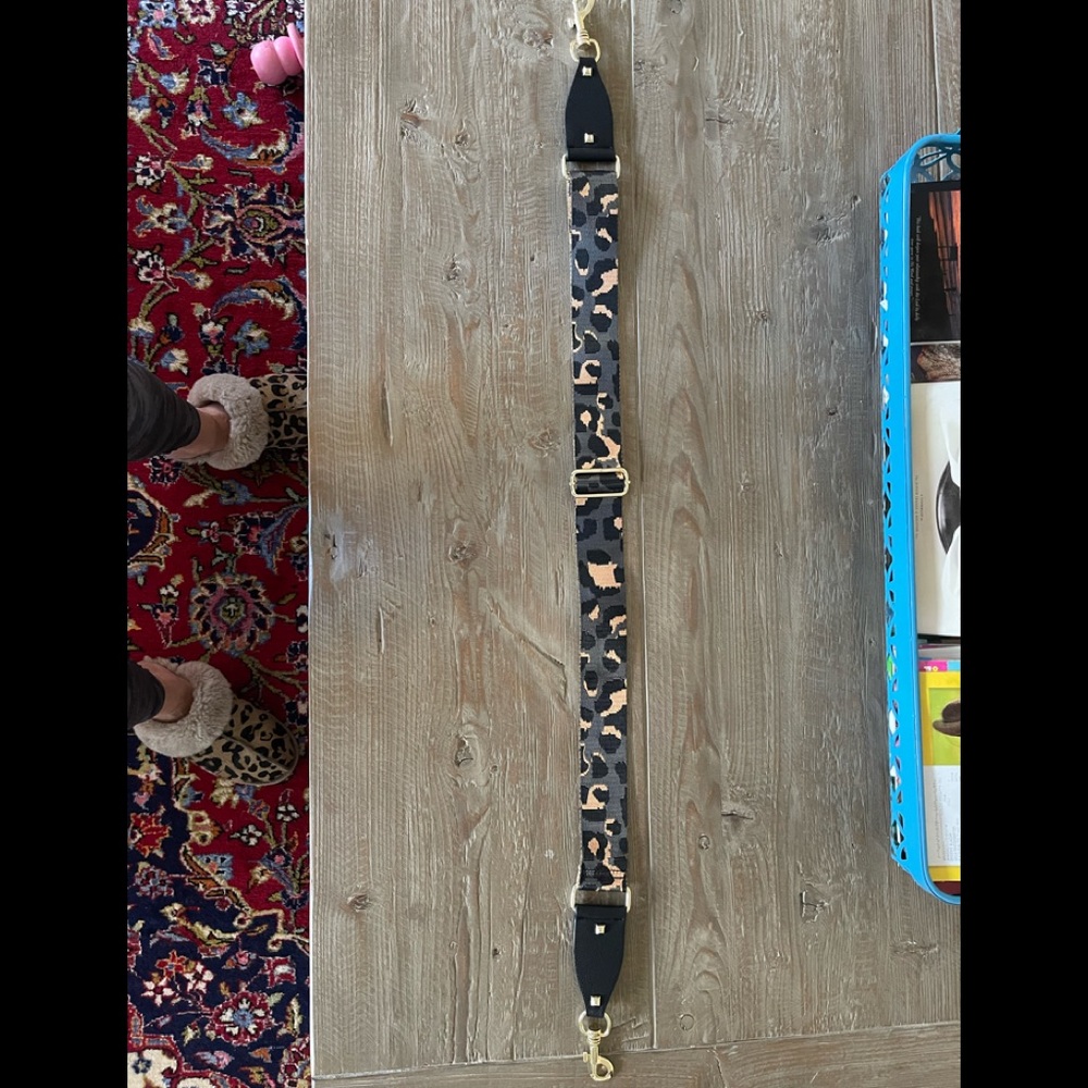 Crossbody or baggage strap.  Cheetah Print